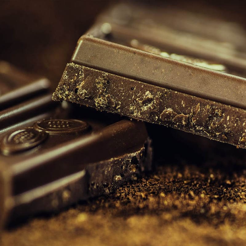 Closeup of dark chocolate broken into squares